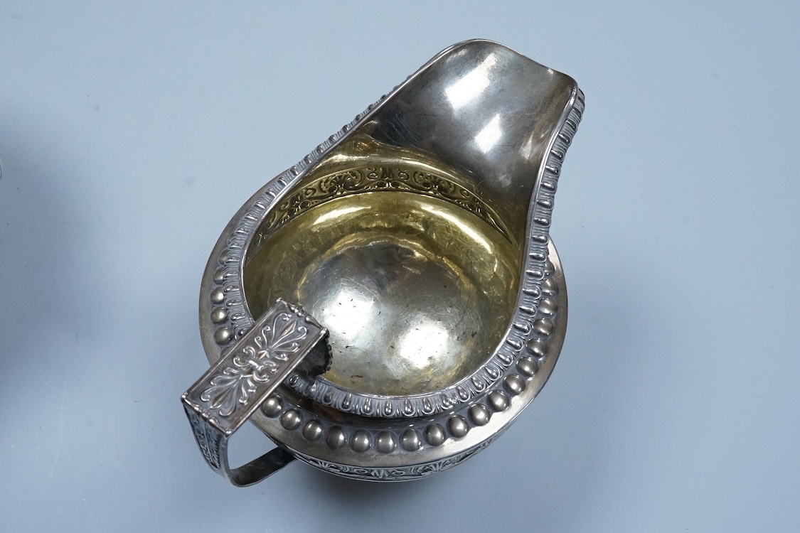 A George III Scottish silver two handled sugar bowl and matching cream jug, Robert Gray & Son, Edinburgh, 1814, sugar bowl height including handles, 11.5cm, 22.8oz.